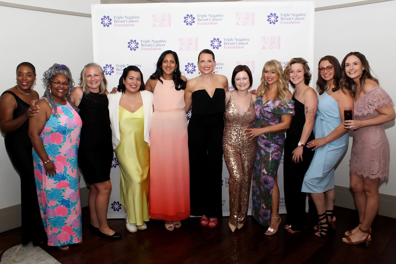 TNBC Thrivers with Executive Director of TNBC Foundation, Hayley Dinerman, from left to right: Tiffany Clifton-Reed, MSHA, Erin Perkins, Lauren Chiluiza, Vaishalee Howey, Lorelei Colbert, Kelly Thomas, Chance Osborne, Macee Maddock, Paige Glassman